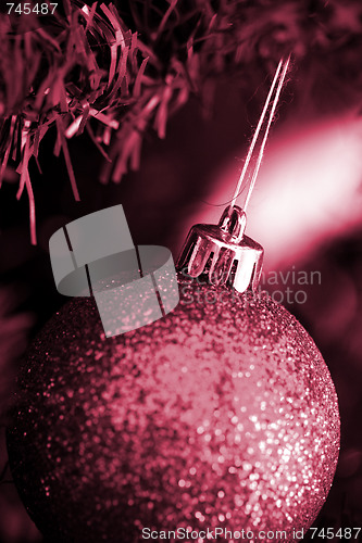 Image of Christmas ornaments on tree.