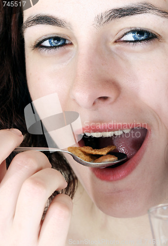 Image of Young people eating milk with cereals