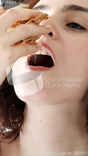 Image of Young people eating milk with cereals