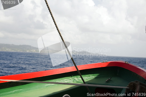 Image of bow life boat on ferry with st. vincent in the background