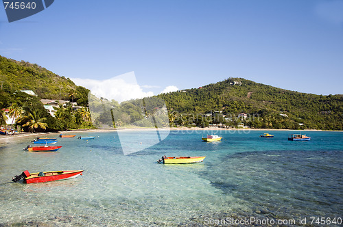 Image of friendship bay with colorful native fishing boats bequia
