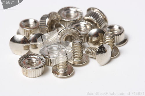 Image of Many screws and nuts isolated on white background