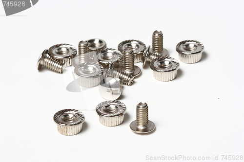 Image of Many screws and nuts isolated on white background