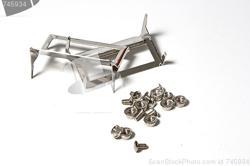 Image of Many screws and nuts isolated on white background