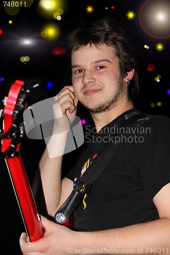 Image of The bass guitarist