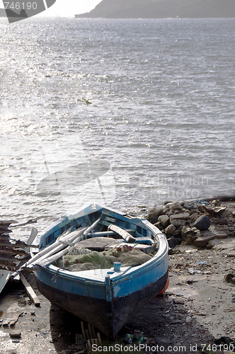 Image of hand built native fishing boat on shore bequia