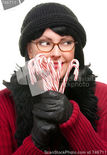 Image of Pretty Woman Holding Candy Canes