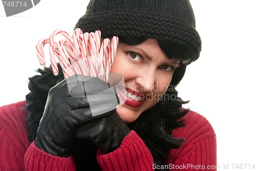 Image of Pretty Woman Holding Candy Canes