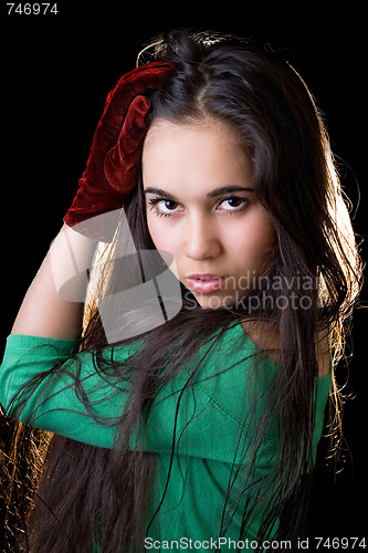 Image of Portrait of the pretty girl in a green jacket