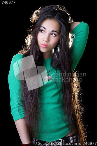 Image of Portrait of the sexy young woman. Isolated on black