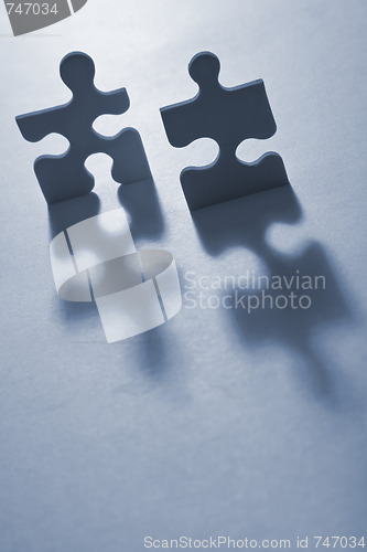 Image of Jigsaw People with Dramatic Light