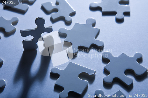 Image of Jigsaw Pieces with Dramatic Light