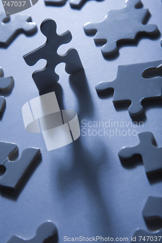 Image of Jigsaw Pieces with Dramatic Light