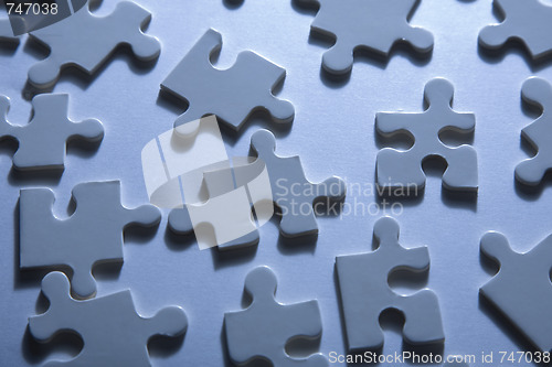 Image of Jigsaw Pieces with Dramatic Light