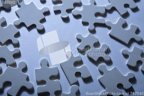 Image of Jigsaw Pieces with Dramatic Light