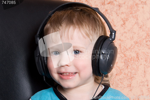 Image of child in ear-phones