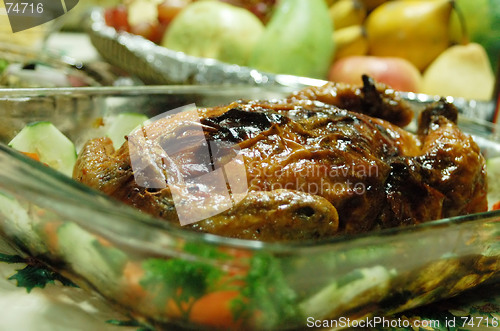 Image of stuffed boned chicken served on glass tray