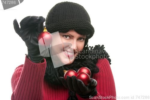 Image of Attractive Woman Holding Christmas Ornaments