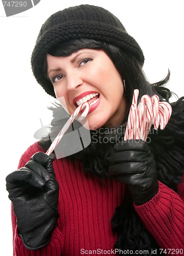 Image of Pretty Woman Holding Candy Canes
