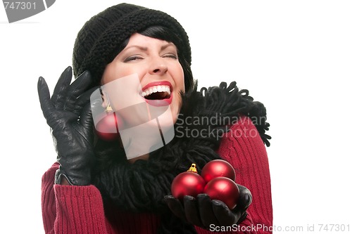 Image of Attractive Woman Holding Christmas Ornaments