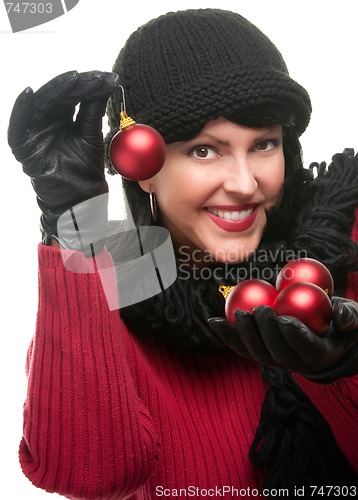 Image of Attractive Woman Holding Christmas Ornaments