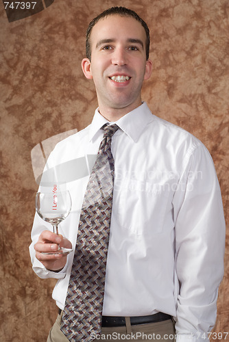 Image of Business Man Holding Wine Glass