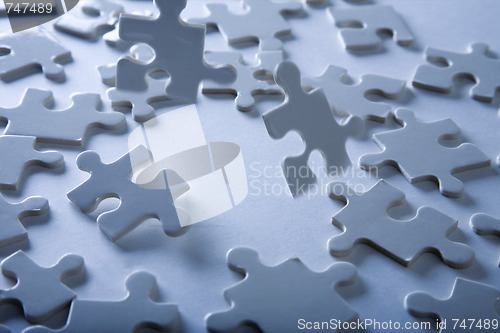Image of Jigsaw Piece with Dramatic Light