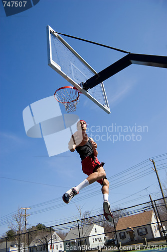 Image of Basketball Player Hang Time