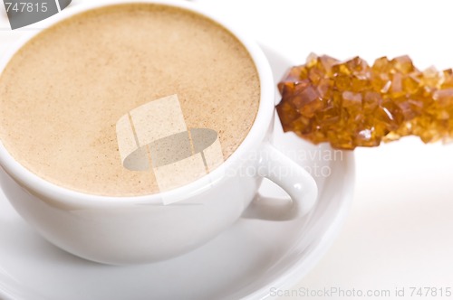 Image of notebook, sugar and cup of coffee