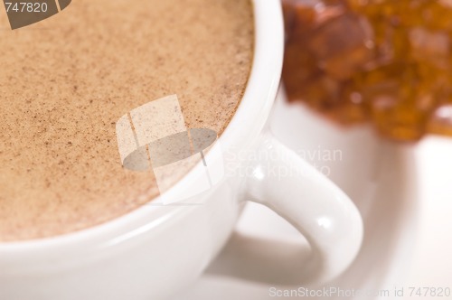 Image of notebook, sugar and cup of coffee