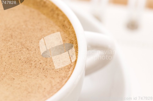 Image of notebook and cup of coffee