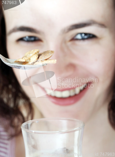 Image of Young people eating milk with cereals