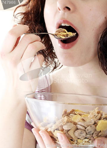 Image of Young people eating milk with cereals