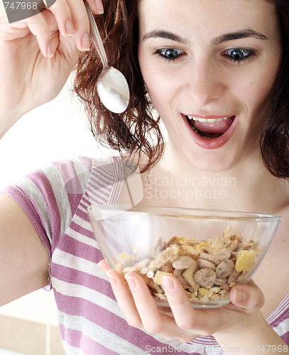 Image of Young people eating milk with cereals