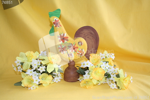 Image of Easter cock  surrounded of daffodils