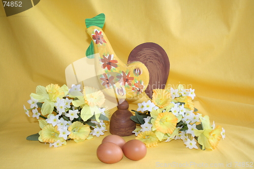 Image of Easter cock  with daffodils and eggs
