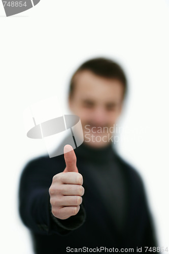 Image of Congratulations - Young man giving thumbs up