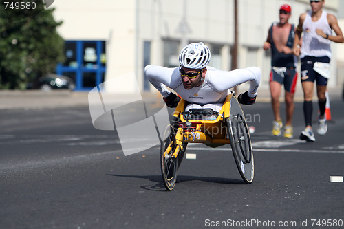 Image of Disabled athlete in a sport wheelchair in Lanzarote marathon 200