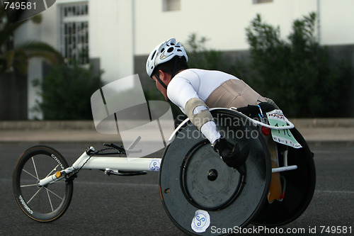 Image of Disabled athlete in a sport wheelchair in Lanzarote marathon 200