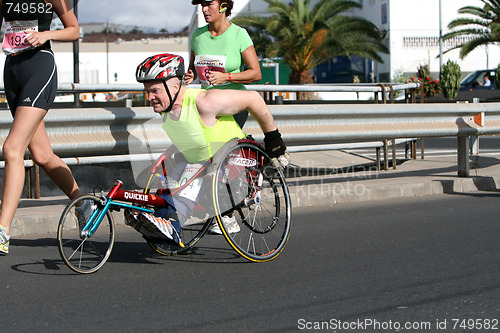 Image of Disabled athlete in a sport wheelchair in Lanzarote marathon 200