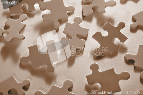 Image of Jigsaw Piece with Dramatic Light