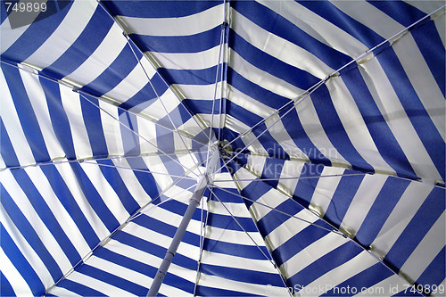 Image of Striped beach umbrella