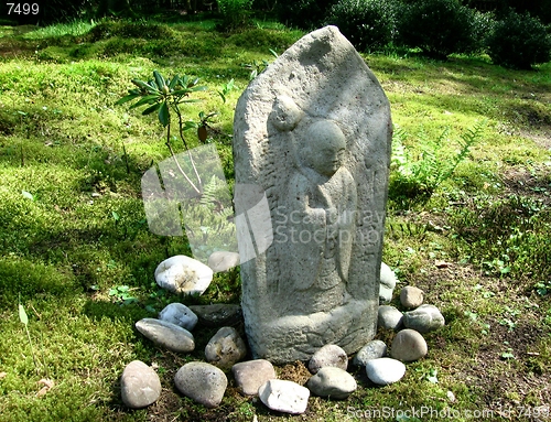 Image of Jizo with lotus flower in hand- travel guardian