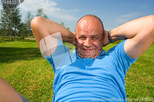 Image of Middle-aged man working out