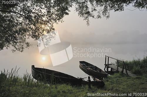 Image of Boats at a sunrise