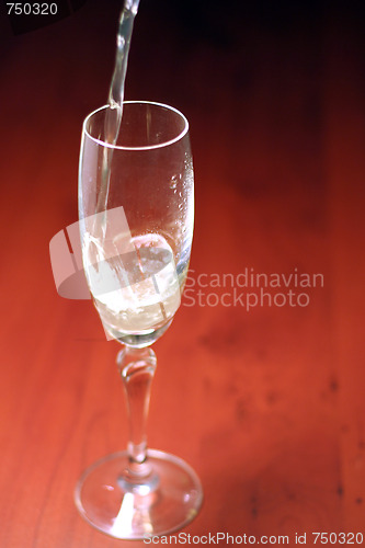 Image of abstract scene of the liquor-glass on varicoloured background