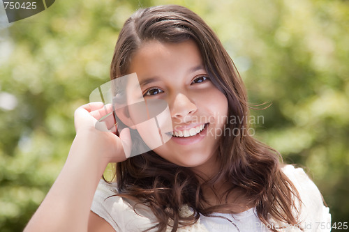 Image of Cute Happy Hispanic Girl in the Park