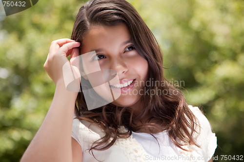 Image of Cute Happy Hispanic Girl in the Park