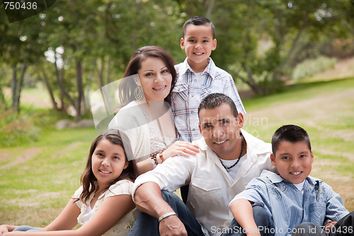 Image of Happy Hispanic Family In the Park