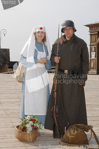 Image of Retro style picture with nurse and soldier